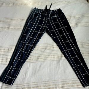 Unisex Adidas warmup jogging pants. Lightweight durable material